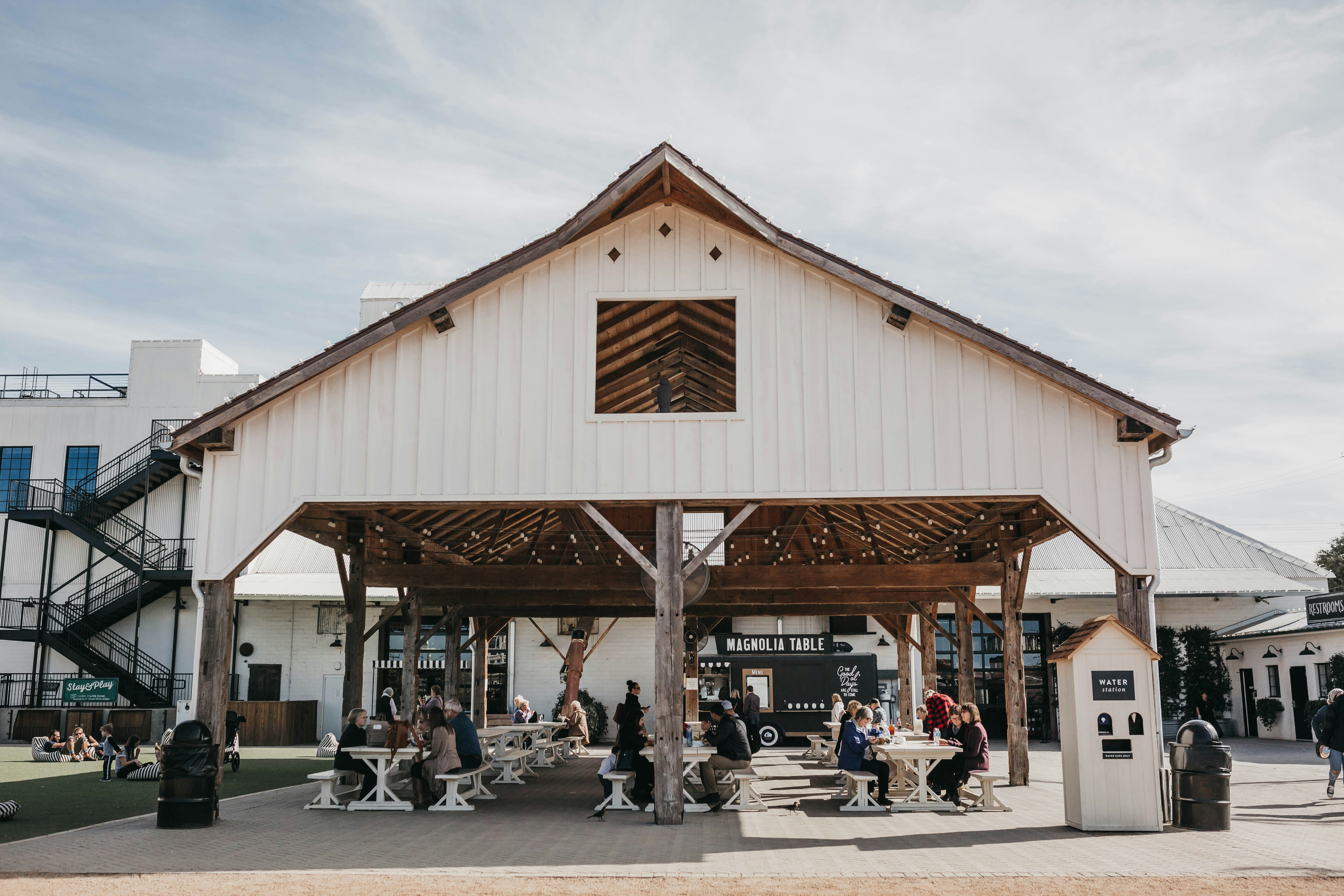 people sitting under gazebo